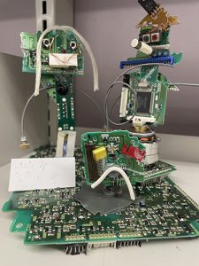 Comp put together to look like a robot and a computer ter boards